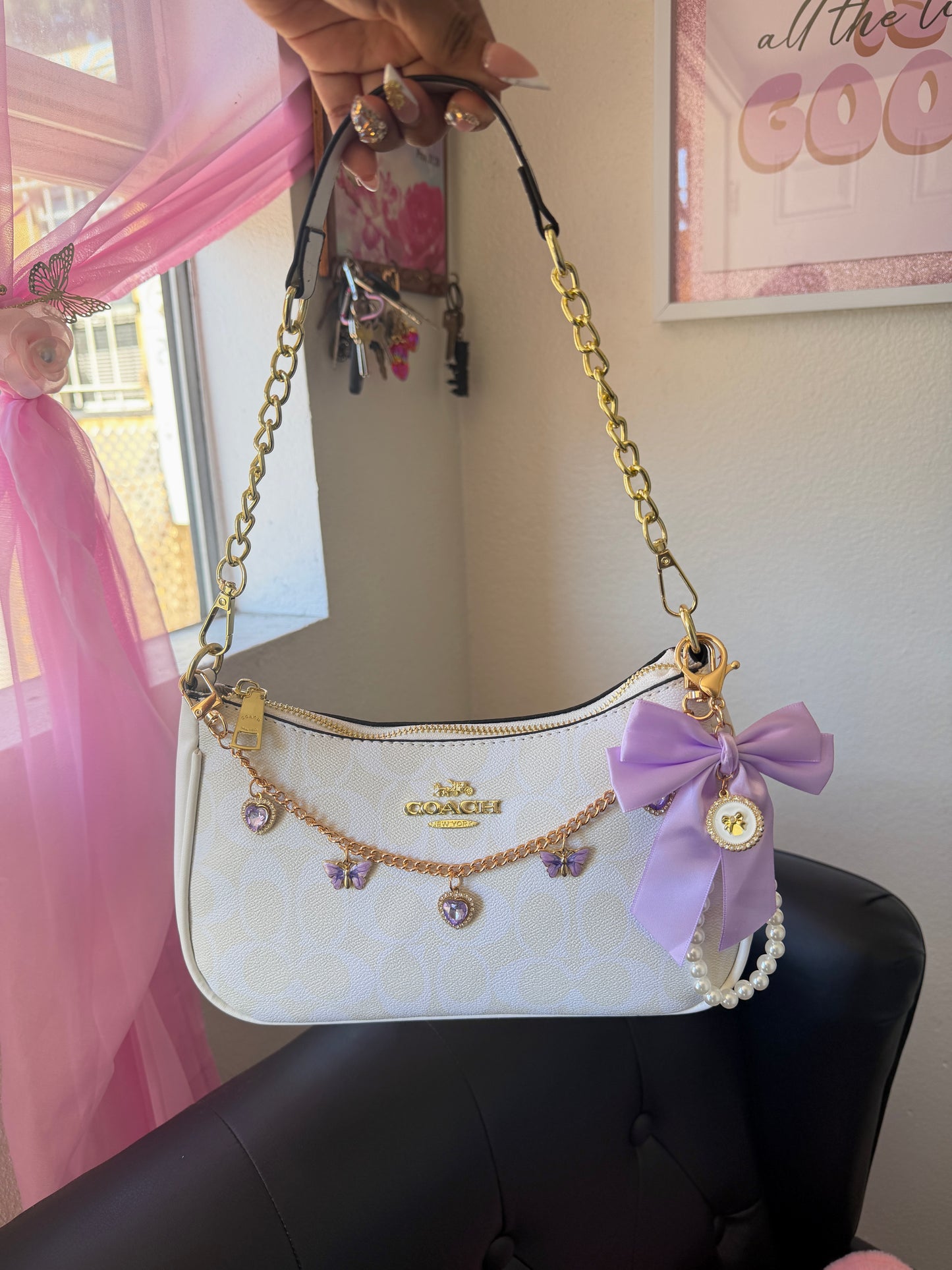White and purple purse