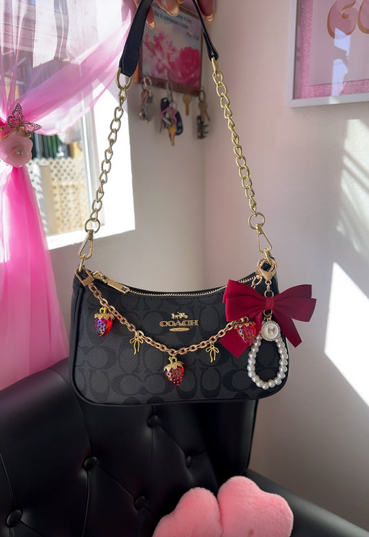 Black strawberry purse